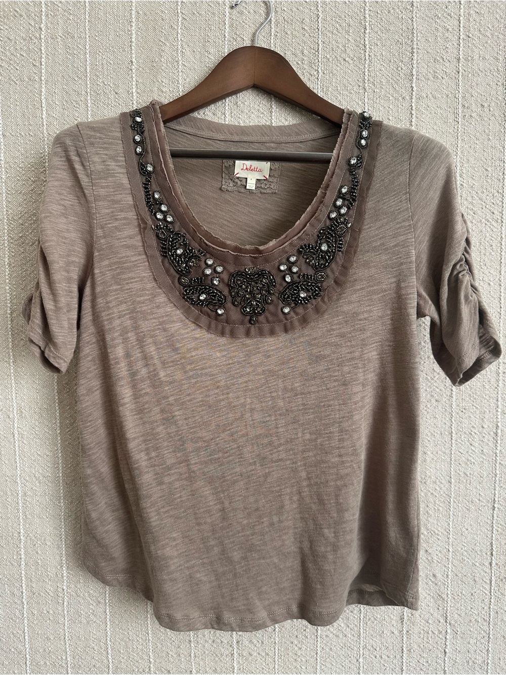NWOT Deletta through Anthropologie embellished blouse size medium.